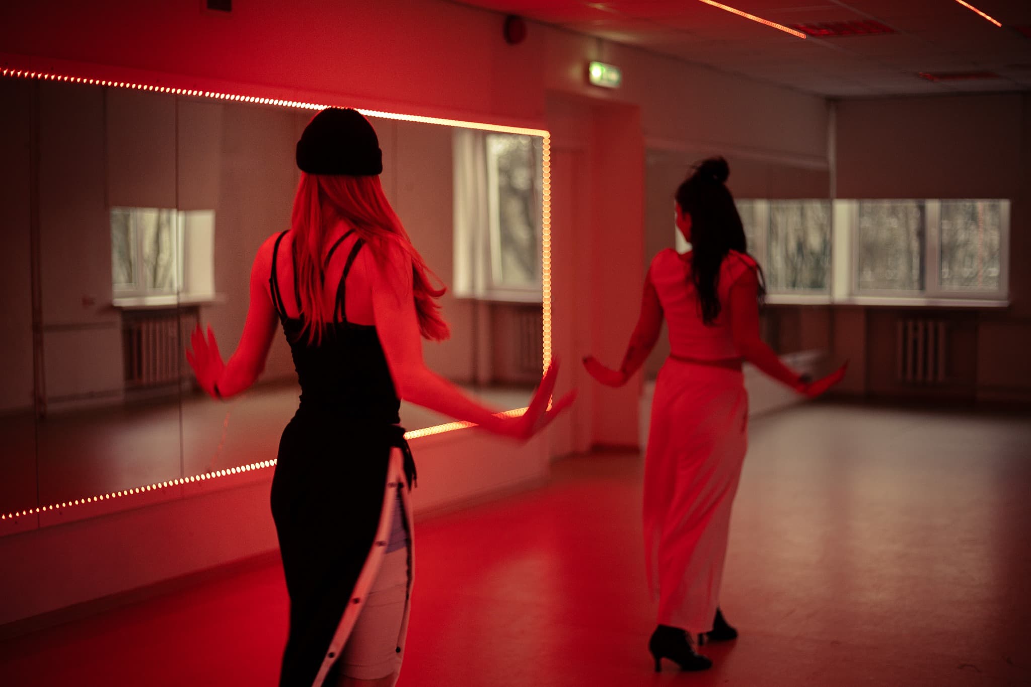 Dance Code mirror practice in dark premium dance studio